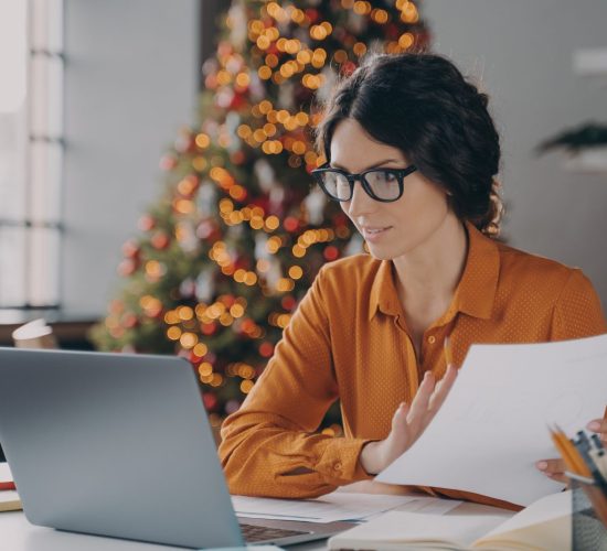 hispanic-business-lady-in-glasses-working-online-i-2021-12-09-06-07-52-utc